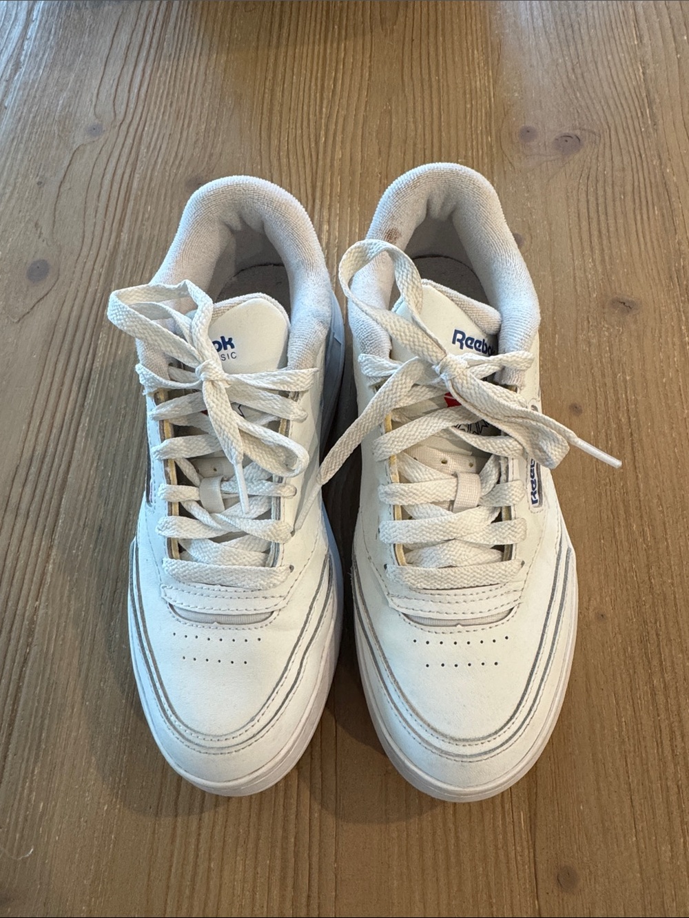 Women’s Leather Reebok White Low-Top Sneakers with Subtle Navy Branding